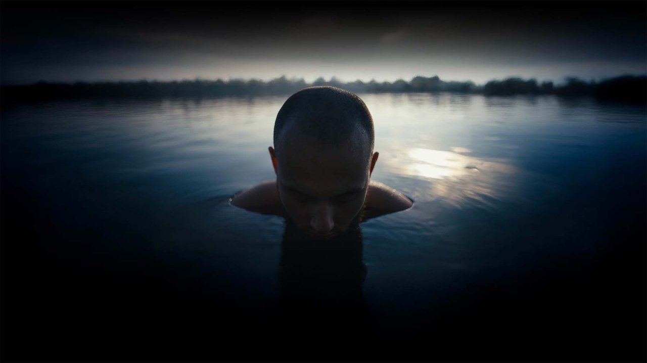 Film still from Sirko — lake swim
